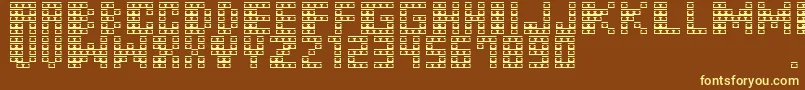 M31MonkeyKong-fontti – keltaiset fontit ruskealla taustalla