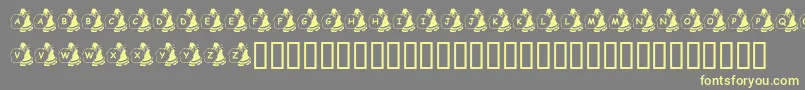 KrSweatinSanta-fontti – keltaiset fontit harmaalla taustalla