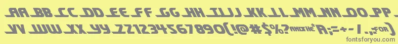 フォントShiningheraldleft – 黄色の背景に灰色の文字