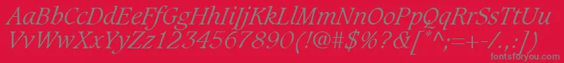 Fonte GrammateusLightSsiLightItalic – fontes cinzas em um fundo vermelho