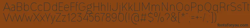 OgonekLight Font – Black Fonts on Brown Background