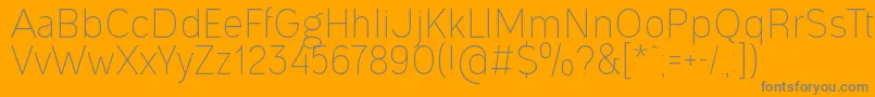 OgonekLight-Schriftart – Graue Schriften auf orangefarbenem Hintergrund