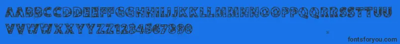 Vtksskulls-Schriftart – Schwarze Schriften auf blauem Hintergrund