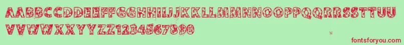 フォントVtksskulls – 赤い文字の緑の背景