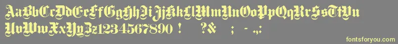 DampfplatzSolidBlack-Schriftart – Gelbe Schriften auf grauem Hintergrund