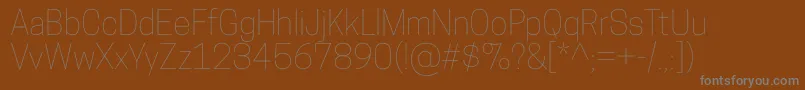 フォントCooperhewittThin – 茶色の背景に灰色の文字