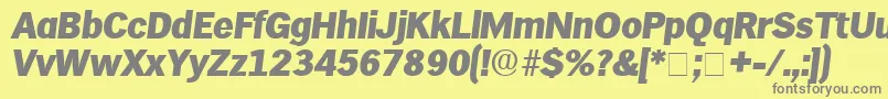 HieroDisplaySsiItalic-Schriftart – Graue Schriften auf gelbem Hintergrund