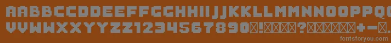 フォントSaboFilled – 茶色の背景に灰色の文字