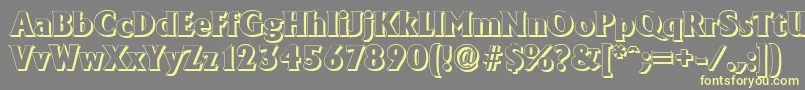 AdelonshadowHeavyRegular-fontti – keltaiset fontit harmaalla taustalla