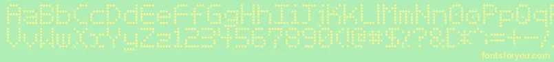 フォントBasicdots – 黄色の文字が緑の背景にあります