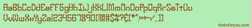 NymonakBrk Font – Brown Fonts on Green Background