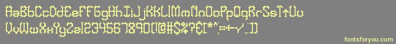 NymonakBrk Font – Yellow Fonts on Gray Background