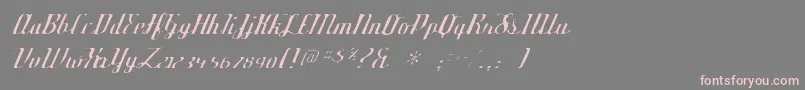フォントDeftonestylusgaunt – 灰色の背景にピンクのフォント