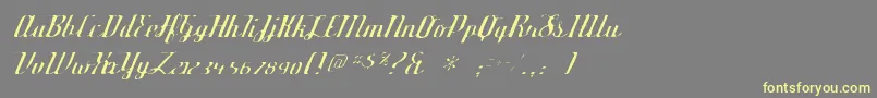 Шрифт Deftonestylusgaunt – жёлтые шрифты на сером фоне