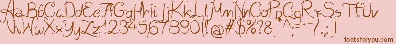 fuente WildScript – Fuentes Marrones Sobre Fondo Rosa