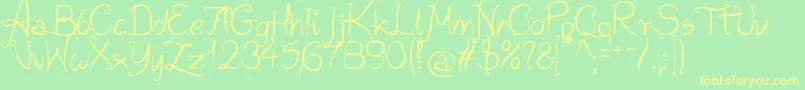 WildScript Font – Yellow Fonts on Green Background