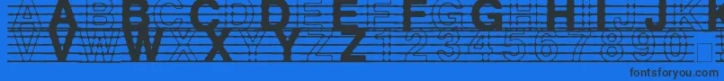 Czcionka DistractedMusician – czarne czcionki na niebieskim tle