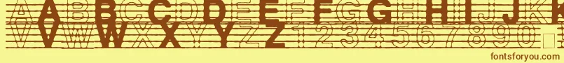 DistractedMusician-fontti – ruskeat fontit keltaisella taustalla