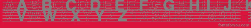フォントDistractedMusician – 赤い背景に灰色の文字