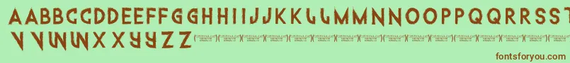 Intothegatorpit Font – Brown Fonts on Green Background