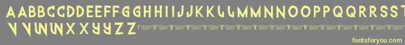 Intothegatorpit-fontti – keltaiset fontit harmaalla taustalla