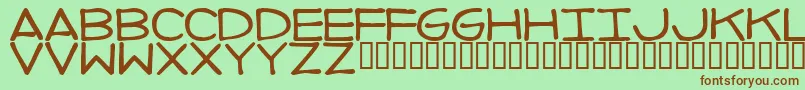 フォントImperfectFont – 緑の背景に茶色のフォント