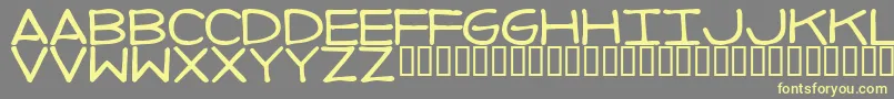 ImperfectFont-fontti – keltaiset fontit harmaalla taustalla