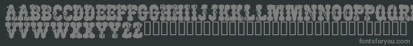 フォントWorkingClassHero – 黒い背景に灰色の文字