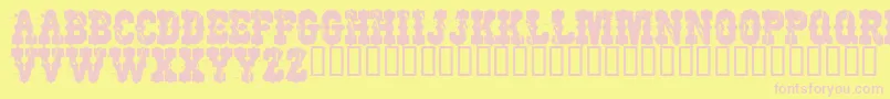 Czcionka WorkingClassHero – różowe czcionki na żółtym tle