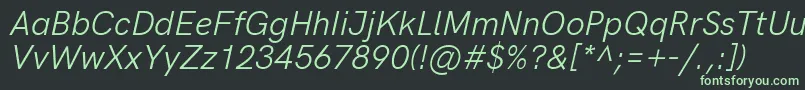 HkgroteskItalic Font – Green Fonts on Black Background