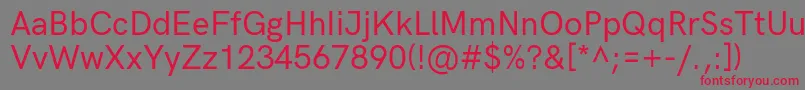 フォントHkgroteskMediumlegacy – 赤い文字の灰色の背景