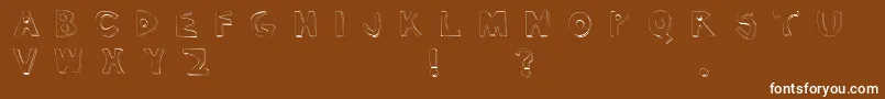 フォントTexasJigsawMassacre – 茶色の背景に白い文字