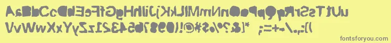 フォントRiptrashcut – 黄色の背景に灰色の文字