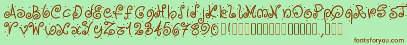 Pwcurvesanddots Font – Brown Fonts on Green Background