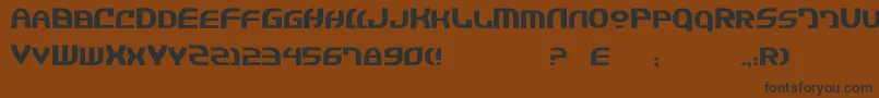 JannisaryExtra-fontti – mustat fontit ruskealla taustalla