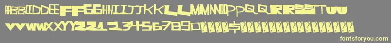 Supercut Font – Yellow Fonts on Gray Background