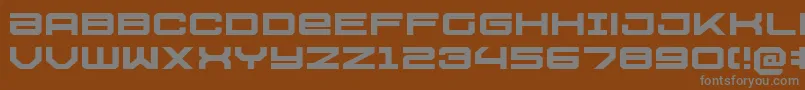 Шрифт U.S.S.DallasExpanded – серые шрифты на коричневом фоне