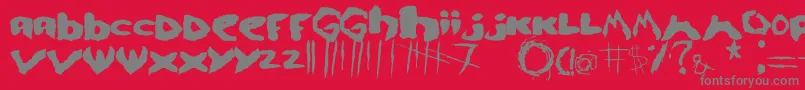 Se7en-Schriftart – Graue Schriften auf rotem Hintergrund