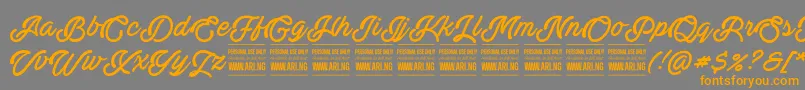 ActoniaPersonal-Schriftart – Orangefarbene Schriften auf grauem Hintergrund