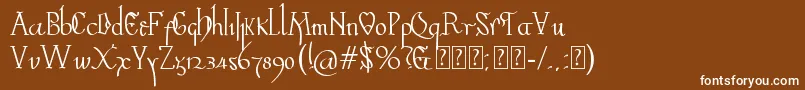 Valpuesta-Schriftart – Weiße Schriften auf braunem Hintergrund