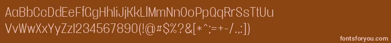 フォントVacersanslightpersonal – 茶色の背景にピンクのフォント