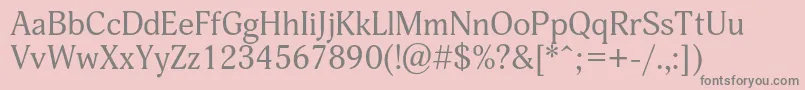Adonisc-fontti – harmaat kirjasimet vaaleanpunaisella taustalla