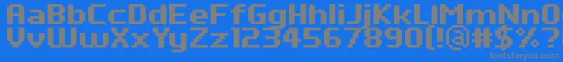 PfTempestaSevenBold-fontti – harmaat kirjasimet sinisellä taustalla