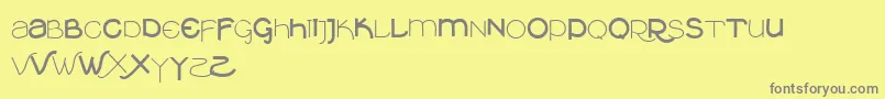 Vtksclean-Schriftart – Graue Schriften auf gelbem Hintergrund