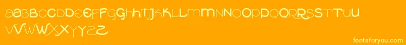 Vtksclean Font – Yellow Fonts on Orange Background