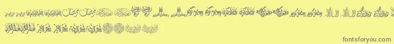 FelicitationArabicRamadan-fontti – harmaat kirjasimet keltaisella taustalla