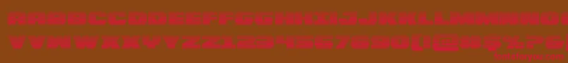 フォントBummergrad – 赤い文字が茶色の背景にあります。