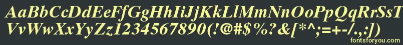 フォントGrecoTenSsiBoldItalic – 黒い背景に黄色の文字