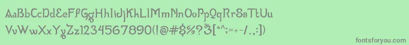 フォントWizzta – 緑の背景に灰色の文字