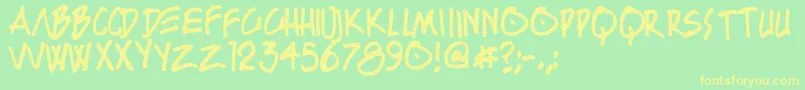 BoutonKursiv Font – Yellow Fonts on Green Background